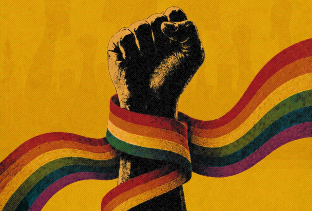 Raised fist wrapped in a rainbow flag representing gender and sexuality activism in exile